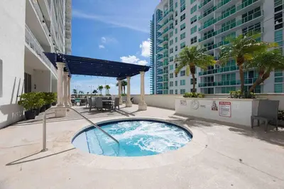 a small swimming pool on a balcony of a building at Iconic High floor 3 bedrooms in the heart of Miami in Miami
