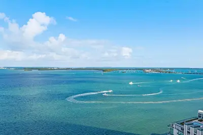 an aerial view of a large body of water with boats at Spacious Ocean view unit in the heart of Brickell in Miami
