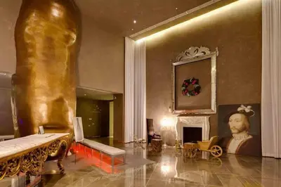 a living room with a fireplace and a statue in it at Emblematic unit at Icon in the heart of Brickell in Miami