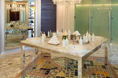a bathroom with two sinks and a large mirror at Emblematic unit at Icon in the heart of Brickell in Miami