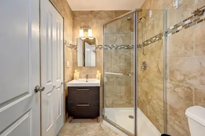 a bathroom with a shower and a sink at Great Location 5BR Heated Pool near Hollywood Beach in Hollywood