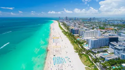 an aerial view of a beach and the ocean at Oceanfront Private Residence at South Beach - 828 in Miami Beach