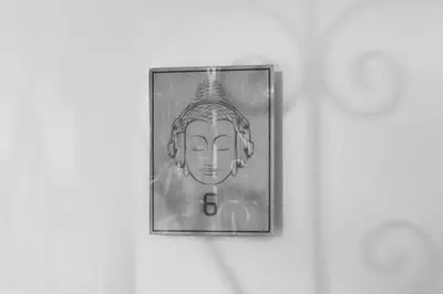 a picture of a buddha sign on a wall at Wonderful Studio Residence 15 min from the beach in Miami
