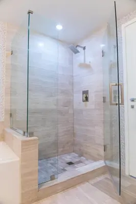 a shower with a glass door in a bathroom at Brickell House Dreams - Luxury Stay and Amenities in Miami