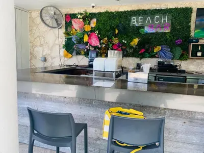 two chairs sitting in front of a beauty counter at Beautiful penthouse condo with stunning views of both ocean and city in Hollywood
