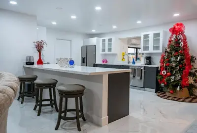 a kitchen with a christmas tree in the middle at Welcome to 305 Rentals in Miami