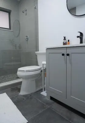 a bathroom with a toilet and a shower and a sink at Welcome to 305 Rentals in Miami