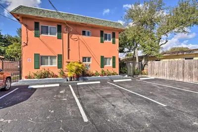 a parking lot in front of a building at Fort Lauderdale Apt Near Beaches and Shopping! in Fort Lauderdale
