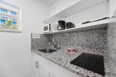 a kitchen with a sink and a counter top at Hollywood Beach Retreat Studio - M23 in Hollywood