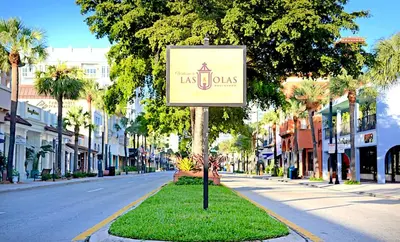a sign in the middle of a city street with at Unique Las Olas Stay Pool Free Parking in Fort Lauderdale