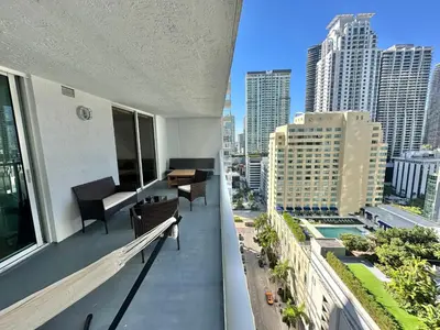 a balcony of a building with a view of the city at City & Sea View+FREE Parking Modern Condo in Miami