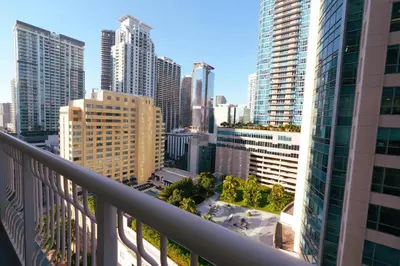 a view of a city skyline from a balcony at City & Sea View+FREE Parking Modern Condo in Miami