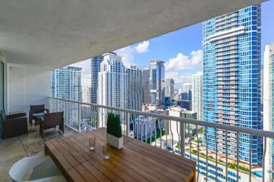 a balcony with a view of a city skyline at Centric 40thFloor Brickell Condo FREE parking by Palermo Home Miami in Miami