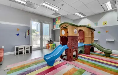 a childrens play room with a slide at Centric 40thFloor Brickell Condo FREE parking by Palermo Home Miami in Miami