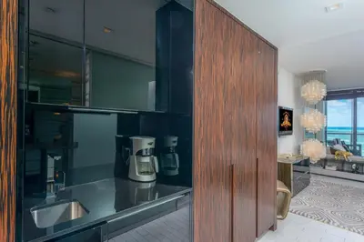 a kitchen with a counter with a blender on it at Stunning 3B Oceanfront at South Beach - 1229 in Miami Beach