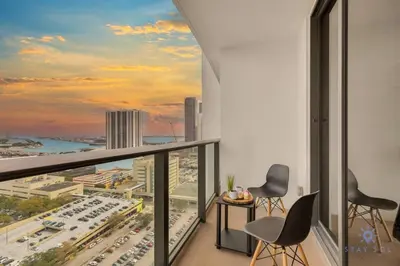 a balcony with a view of a city at Modern Miami Gem - City View Condo - Free Parking in Miami