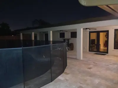 a view of a house at night at Pool home in Miami in Tamiami