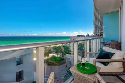 a balcony with a view of the ocean at Amazing apartment - Lyfe Resort & Resident in Hollywood