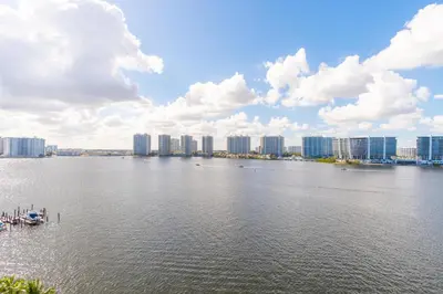 a large body of water with a city in the background at Marina Bay 1008 in Miami Beach
