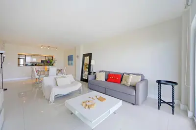 a living room with a couch and a table at Ocean Reserve 1524 in Miami Beach
