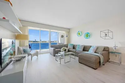 a living room with a couch and a table at Golden Bay 506 in Miami Beach