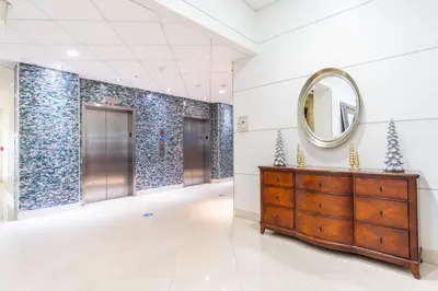 a dressing room with a mirror and a dresser at Ocean Reserve 1508 in Miami Beach
