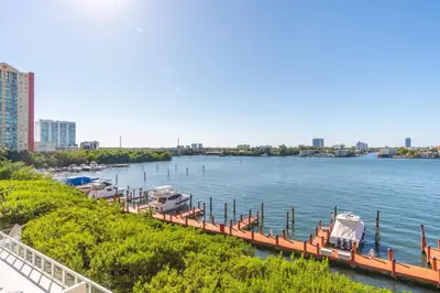 a marina with boats docked in the water at Golden Bay 508 in Miami Beach