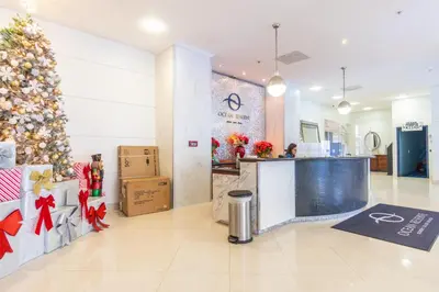 a store lobby with a christmas tree and a counter at Ocean Reserve 818 in Miami Beach