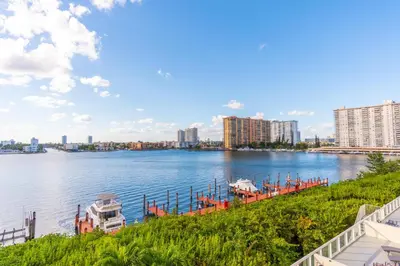 a view of a river with buildings in the background at Golden Bay 502 in Miami Beach