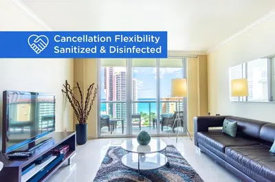 a living room with a couch and a table at Ocean Reserve 1515 in Miami Beach