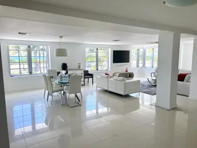 a living room with a couch and a table at WOW! Best Location! Best Unit! New Renovated South Beach Ocean Front in Miami Beach