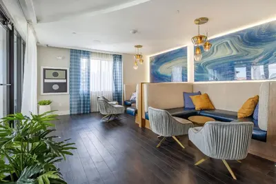 a living room with a couch and chairs at Doral 1BR w wd pool gym nr Airport MIA-17 in Miami