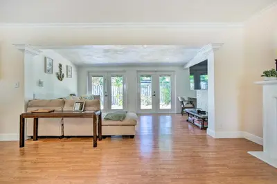 a living room with a couch and a table at Vacation Rental with Private Pool in Wilton Manors in Fort Lauderdale