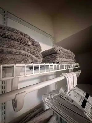 a shelf in a refrigerator filled with towels at Ft Lauderdale Jewel in Fort Lauderdale