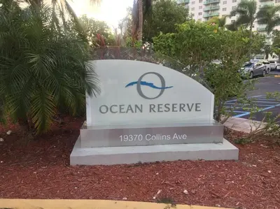 a sign for an ocean reserve in a city at Beautiful Apartment in Sunny Isles STR-01432 in Miami Beach