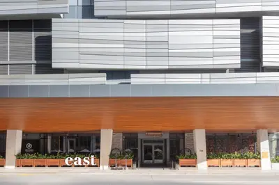 a tall building with a c class sign on it at EAST Miami Residences in Miami