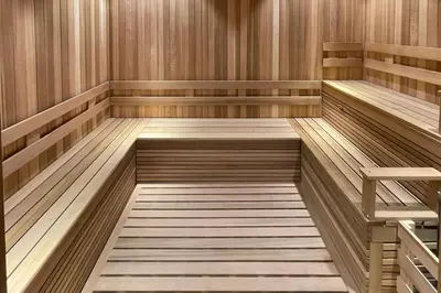 an empty sauna with wooden floors and wooden shelves at Little Havana 1br w pool gym near restaurants MIA-48 in Miami