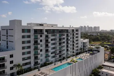 an aerial view of a building with a swimming pool at Little Havana 1br w pool gym near restaurants MIA-48 in Miami