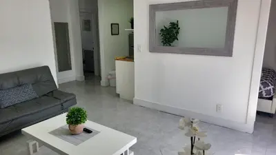 a living room with a couch and a table at Funston in Hollywood