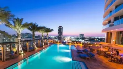 a large swimming pool on top of a building at Lyfe-1005 in Hollywood