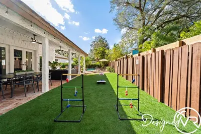 a yard with miniature golf equipment on the grass at Villa wPool Firepit BBQ in Hollywood