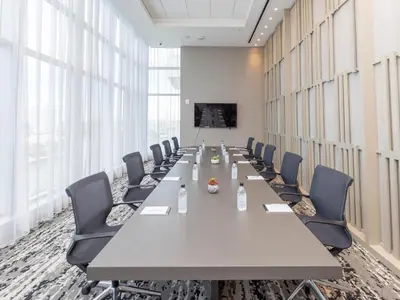 a large conference room with a long table and chairs at Hyde Beach House - Stunning 2bd 2ba - Apt - Ocean & Intercostal views in Hollywood