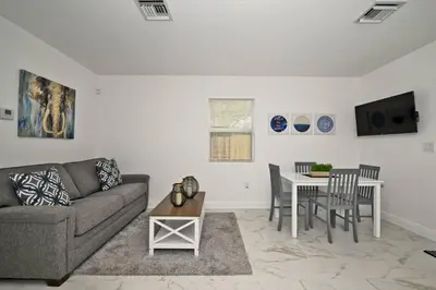 a living room with a couch and a table at Enjoy and relax around Fort Lauderdale area!! in Fort Lauderdale