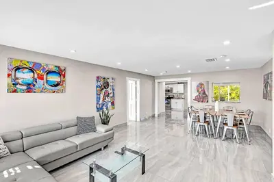 a living room with a couch and a table at Modern Villa with Pool Hollywood Hard Rock Casino in Fort Lauderdale