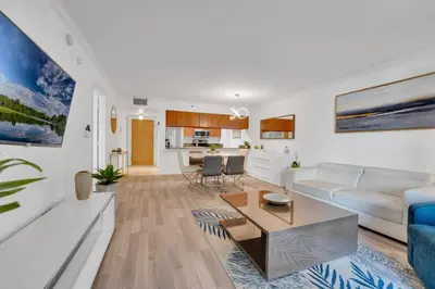a living room with a couch and a table at Impressive Unit in the heart of Brickell W Parking in Miami
