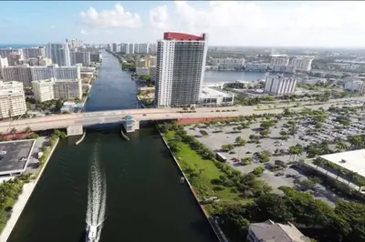 an aerial view of a city with a river and a bridge at Beachfront hotel room to relax and unwind 09B in Hallandale Beach