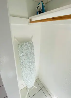a closet with a towel hanging from the wall at Coral Gables / Coconut Grove area FREE parking in Miami