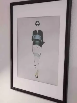 a framed picture of a woman on a wall at LOCATION! Apartment in Coconut Grove with parking in Miami