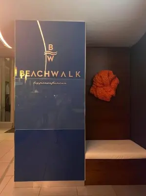 a sign for a room with a bench in a building at Dream Beach Apt 1BR Kitchen & Pool Access 06A in Hallandale Beach