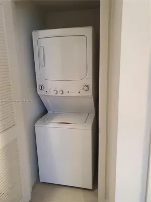 a white washer and dryer in a room at Lux apartment Hyde Beach House in Hollywood
